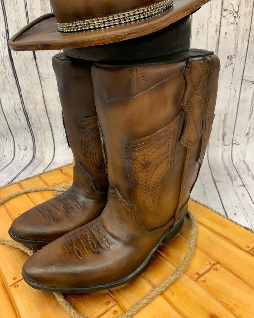 A cake carved into a pair of cowboy boots